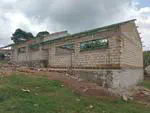 It's July 14, 2025, and the Tegla Loroupe Peace Academy in Kapenguria is building a new boy's dormitory